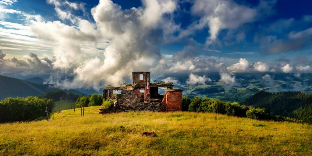 ruins and blue sky in the carpathians. serhii zysko